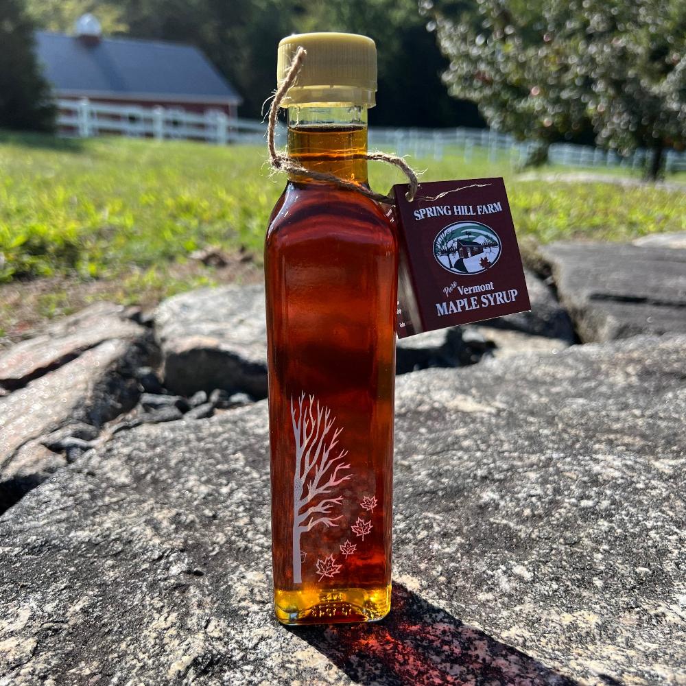 Maple Syrup in a glass leaf bottle - spring hill farm grafton vermont - pure Vermont maple syrup